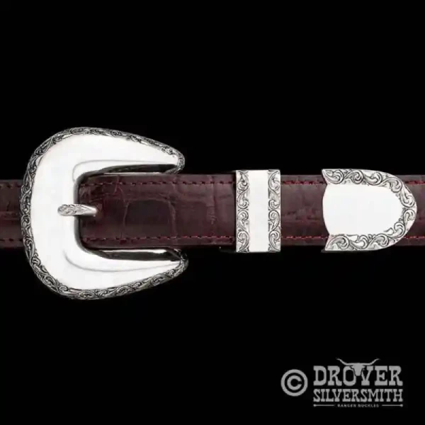 The Range Rider Sterling Silver Buckle Set is meticulously crafted to resemble a mountain landscape on a hand engraved buckle, loop and tip. Add a second loop for a ranger buckle set now!